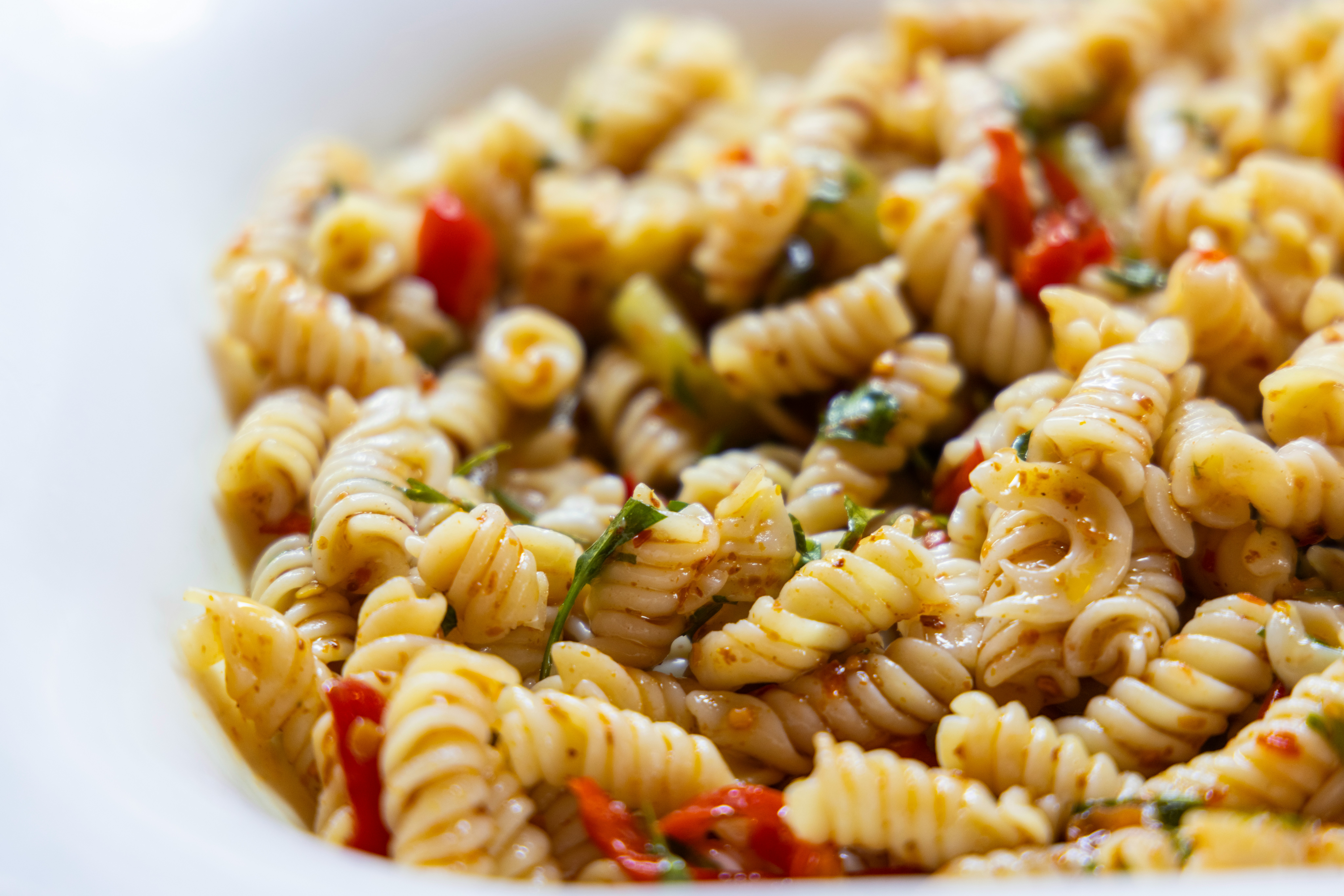 a plate of pasta salad